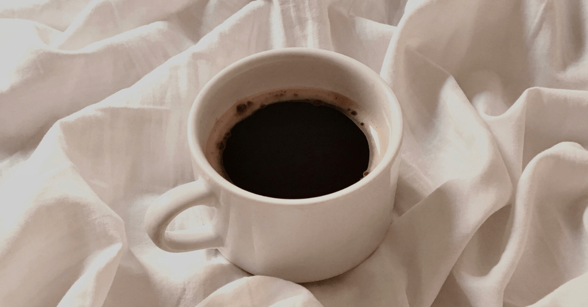 coffee before spilling on clothes and creating stain