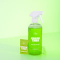 GreenTabs green cleaner Multipurpose Spray with single tab and  forever bottle sitting in front of green backdrop
