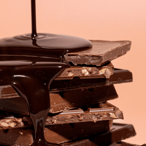 chocolate sauce dripping on chocolate bars