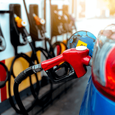 car receiving gasoline for fuel at gasstation