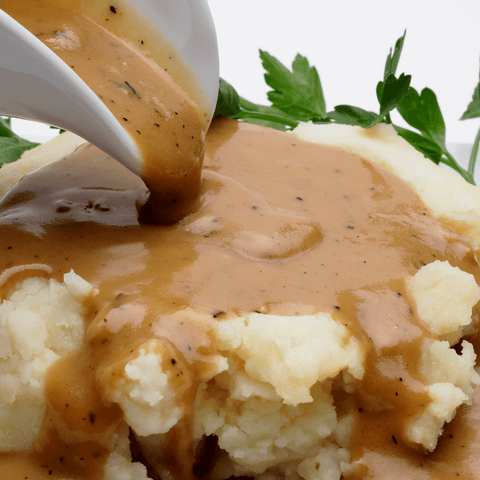 gravy poured onto mashed potatoes