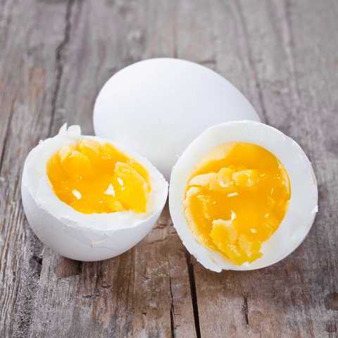 halved soft boiled eggs