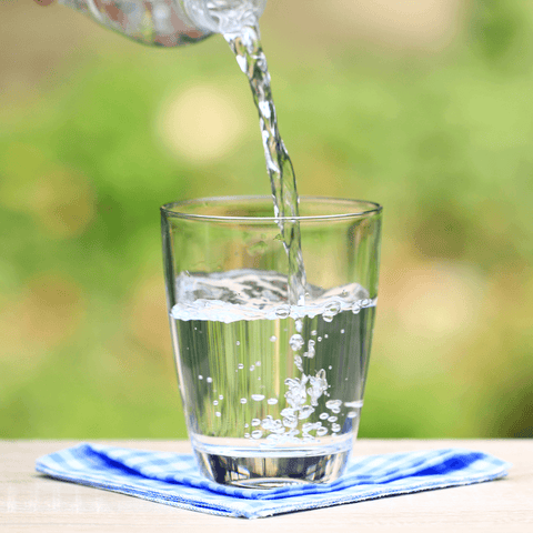 water being poured into glass